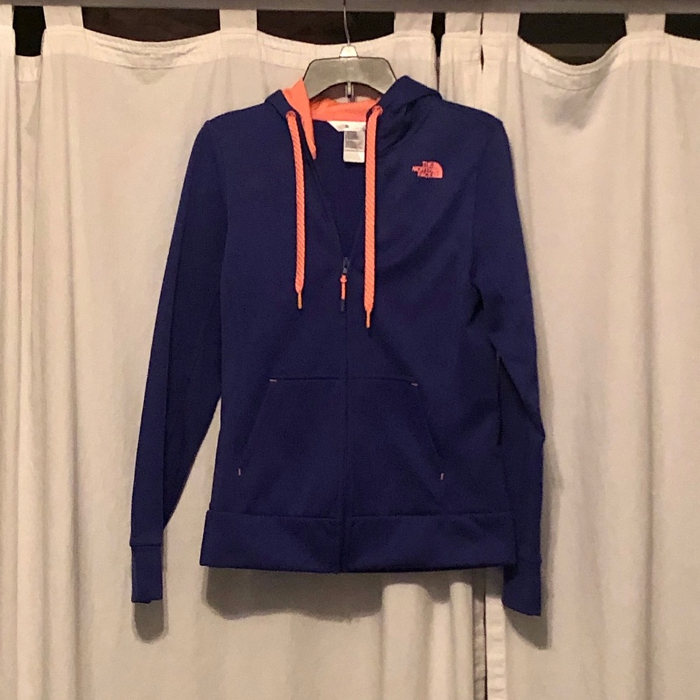 Zip up North Face hoodie.